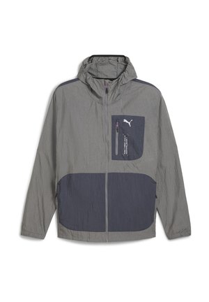 Lightweight gray jacket with a hood, featuring a dark blue accent pocket and zipper, smooth texture, and a sporty design.