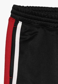 Jordan Pantalones deportivos - black