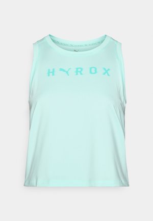 Débardeur turquoise clair en tissu doux, avec un col rond et de larges emmanchures, portant le mot "HYROX" imprimé en turquoise plus foncé.
