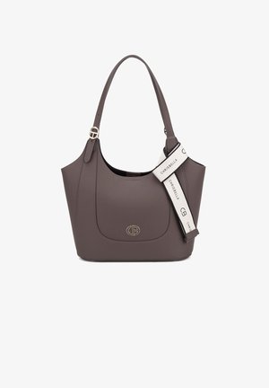 Brown, smooth faux leather handbag with a curved shape, gold-tone logo, and a detachable strap featuring a white label with text.