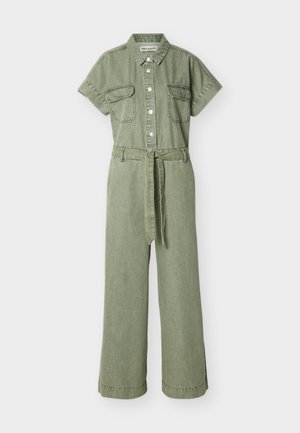Short-sleeve olive green denim jumpsuit with button front, collar, chest pockets, belted waist, and wide leg pants.