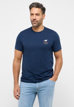 Navy blue t-shirt made of cotton, featuring a round neckline and short sleeves, with a small white horse logo and brand name on the chest.