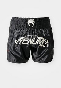 Schwarze Satin-Shorts mit elastischem, strukturiertem Bund, weißer Markenbezeichnung und dezenten Punktmustern im unteren Bereich.