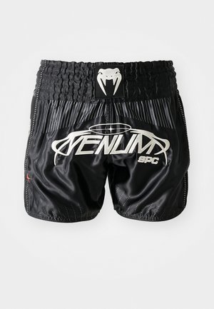 Sorte satin shorts med en struktureret elastisk livrem, hvid branding og subtile prikmønstre på den nederste del.