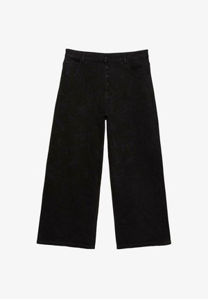Pantalon large noir en denim, avec une taille haute, une braguette à cinq boutons et un motif floral subtil. Texture lisse avec ourlets finis.