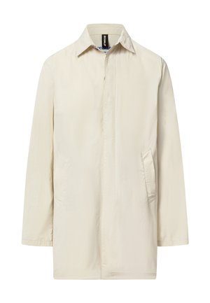 Beige overhemdjack met lange mouwen, een puntige kraag en zijzakken, voorste knopen verborgen achter een beleg.