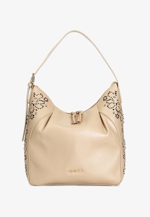 Beige kožená kabelka s výřezovým květinovým vzorem po stranách, s jedním popruhem a zabezpečeným horním uzávěrem s dekoračními třásněmi.