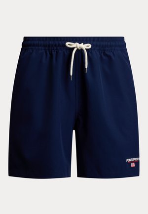 Tengerészkék férfi fürdőnadrág fehér zsinórral, elasztikus derékpánttal és kis Polo Sport logóval, amelyen amerikai zászló látható a bal lábszáron.