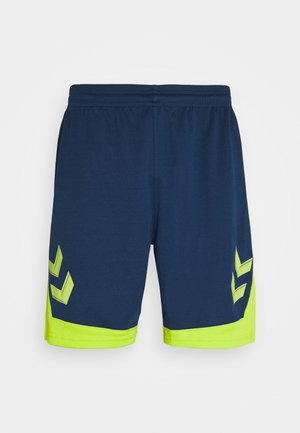 Navy athletic shorts with lime green accents. Features a knit waistband and two zigzag patterns in reflective material on the lower sides.
