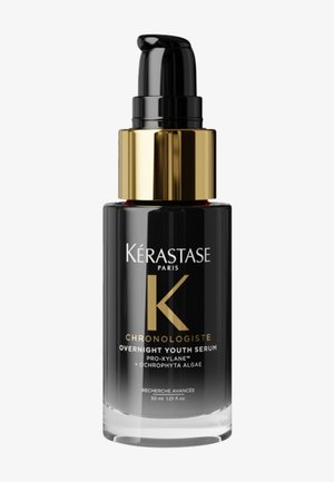 Zwart en gouden fles van Kérastase Chronologiste Overnight Youth serum met pompdoseerder, inhoud 30 ml.