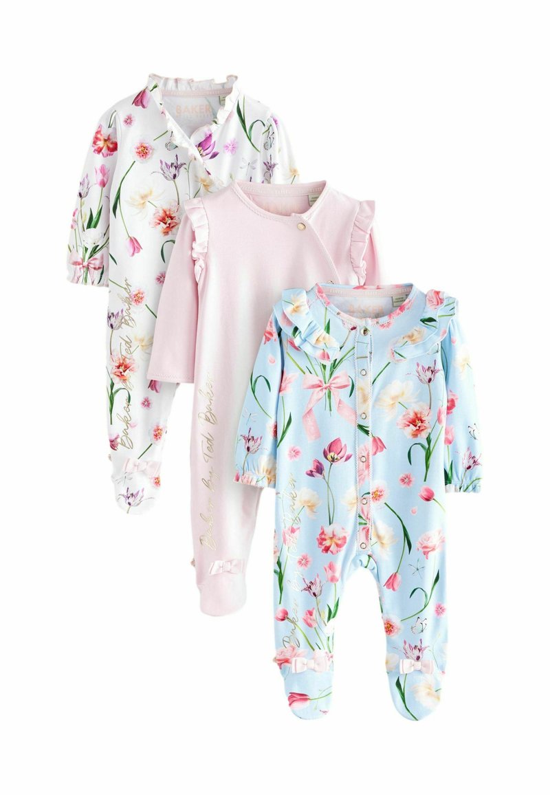 Tres bodies para bebés: uno blanco con estampado floral, uno rosa con cuello acampanado y uno azul claro con diseño floral y lazos.