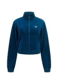 Giacca corta con zip di colore blu navy, maniche lunghe e un piccolo logo triangolare bianco sul lato sinistro del petto.
