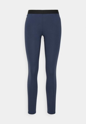 Navy blue leggings with a black elastic waistband, made of smooth, stretchy material. Form-fitting design, suitable for active wear.