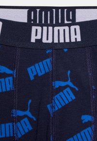 Puma PUMA BOYS AOP BOXER  - Hlače - blue