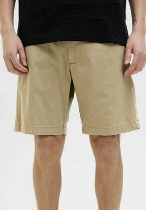 Shorts color khaki realizzati in cotone, con un taglio dritto, orlo arrotolato e tasche frontali. Colore neutro senza motivi o decorazioni visibili.