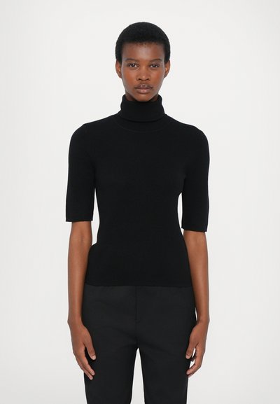 Pull à col roulé noir à manches courtes, confectionné dans un tissu doux, avec une coupe ajustée et une texture lisse.