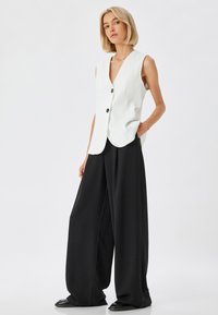 Koton RISE PALAZZO - Pantalones - black