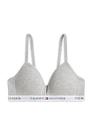 Szary biustonosz z miękkimi miseczkami, regulowanymi ramiączkami i białą elastyczną taśmą z logo i emblematem flagi Tommy Hilfiger.