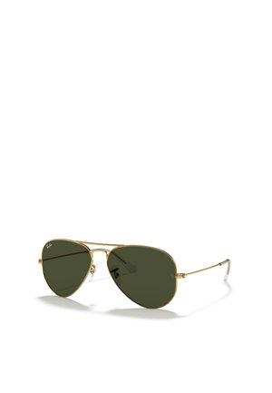 Occhiali da sole aviator con lenti verde scuro, montatura in metallo dorato e punte delle astine trasparenti. Presentano naselli regolabili per il massimo comfort.
