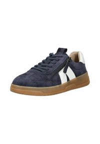 Navy suede sneaker with white accents, flat laces, side zipper, and a rubber sole. Textured materials and sporty design.