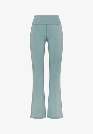 Hoch taillierte, helltürkisfarbene Schlaghose mit einem gerippten Bund und sichtbaren Nähten an Vorderseite und Saum.