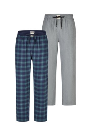 Deux pantalons de détente : l’un à carreaux bleu marine et vert avec une ceinture élastique, l’autre gris clair avec des fines rayures et un cordon de serrage.