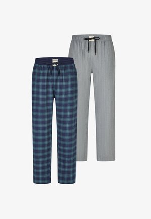 Deux pantalons de détente : l’un à carreaux bleu marine et vert avec une ceinture élastique, l’autre gris clair avec des fines rayures et un cordon de serrage.