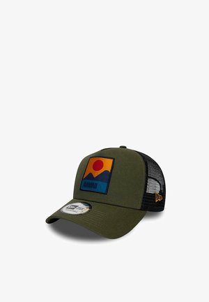 Green trucker cap featuring a rectangular embroidered patch with a sun and mountain design. Black mesh back, curved bill, and snapback closure.