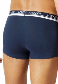 Marineblauwe boxershorts van zachte stof, met een witte merkband met stiksels en een aansluitende, slank passende pasvorm.