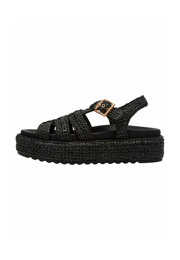 Schwarze Plattform-Sandalen mit geflochtenen Oberschnallen und einer Schnallenakzentuierung. Texturiertes Fußbett mit einer dicken geflochtenen Sohle, die erheblichen Auftrieb bietet.
