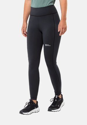 Zwarte leggings van rekbaar materiaal met een hoge tailleband. Ze hebben een strak ontwerp en gestikte accenten. Merklogo op de bovenbeen.