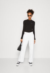 Tommy Jeans SWEATER - Jersey de punto - black