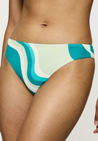 Wielokolorowe majtki bikini w tealistym, jasnooliwkowym i białym wzorze fal. Gładki materiał z mid-rise krojem i bezszwowym wykończeniem.