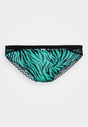 Turkizna čipkasta tangica z črnimi tigerjastimi črtami, zobeče robove in cvetlične čipkaste dodatke na straneh. Mehka tkanina, srednje visoka zasnova.