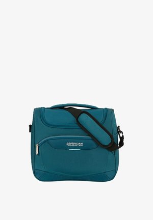 Borsa a tracolla American Tourister turchese con tracolla imbottita, tasca frontale con cerniera e manico superiore, progettata per viaggi e uso quotidiano.