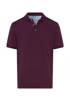 Polo shirt in donker bordeaux katoen, met een knoopsluiting met twee knopen en een opgevouwen kraag. Subtiele contraststiksel en merkembleem.