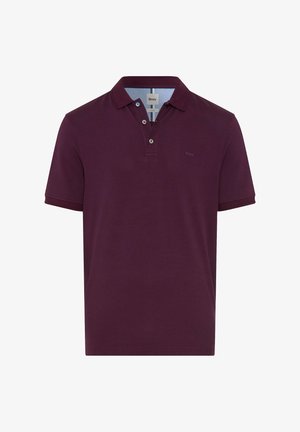 Polo in cotone bordeaux scuro, con patta a due bottoni e colletto a falda. Sottile cucitura a contrasto e etichetta con marchio.