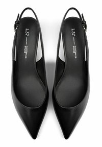 Black pointed toe slingback shoes, made of smooth leather, featuring a slim ankle strap and a flat sole with a cushioned interior.