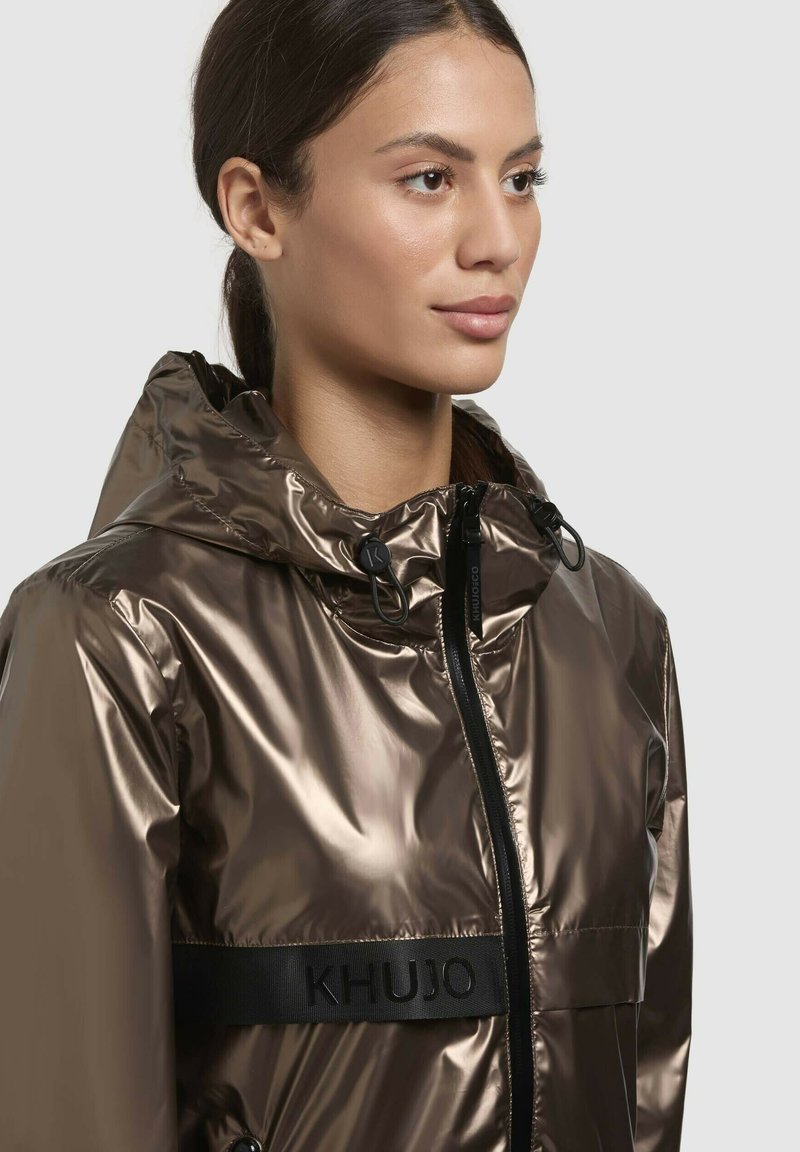 khujo EVELYN Waterproof jacket braun metallic/brown Zalando