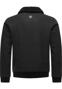 Black sweatshirt featuring a textured faux fur collar, ribbed cuffs, and hem, with a circular logo at the back neckline.