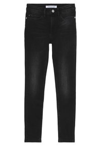 Jeans skinny negros de mezclilla, con un diseño clásico de cinco bolsillos, herrajes de metal y un sutil desvanecimiento, que ofrecen una silueta ajustada y elegante.