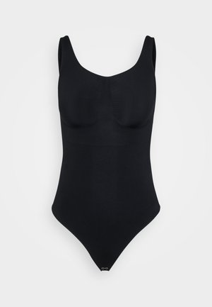 Svart sømløs bodysuit med brede stropper, formede kopper og trykknapper ved skrittet, vist mot en hvit bakgrunn.