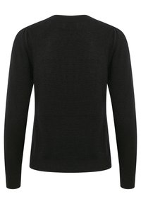 Must mustarõngaga must pull, millel on pikad, liibuvad varrukad ja ümmargune kaelus. Valmistatud pehmest, tekstuuriga kangast, mille ääres on peened sooned.