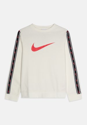 White long-sleeve crewneck sweatshirt with red Nike logo on chest and black stripes with small red logos running down both sleeves.