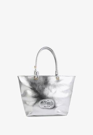 Silver tote bag made of reflective material. Features two handles, gold hardware, and a prominent embossed logo on the front.