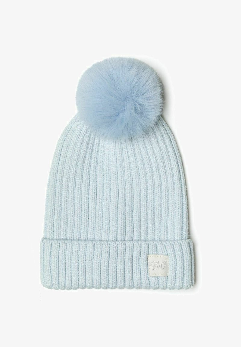 Light blue, knitted beanie with ribbed texture and a fluffy blue pom-pom on top. Features a small, white tag on the brim.