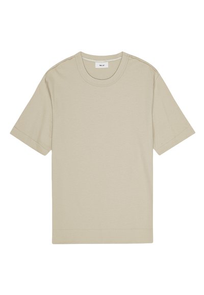 T-shirt in cotone beige con collo rotondo, maniche corte e orlo dritto. Texture liscia e design minimalista.