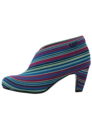 Low-heeled ankle boot with multicolored horizontal stripes in blue, purple, green, and black fabric, featuring a side logo.