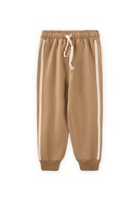 Beige Jogginghosen mit elastischem Bund und Kordelzug, ausgestattet mit zwei weißen Seitenstreifen und Rippbündchen an den Säumen.