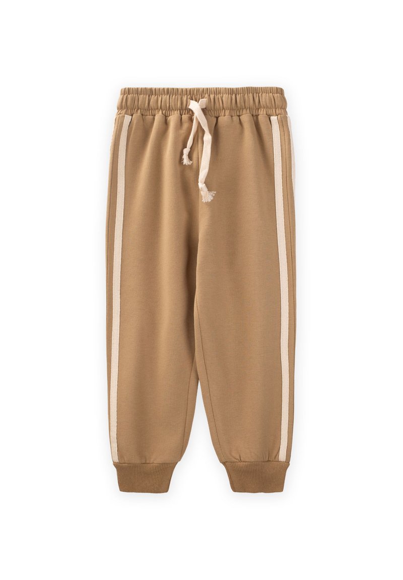 Beige Jogginghosen mit elastischem Bund und Kordelzug, ausgestattet mit zwei weißen Seitenstreifen und Rippbündchen an den Säumen.